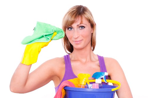 Cleaner preparing equipment safely before a cleaning task