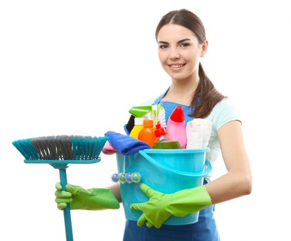 Technician treating mattress stains during local cleaning service